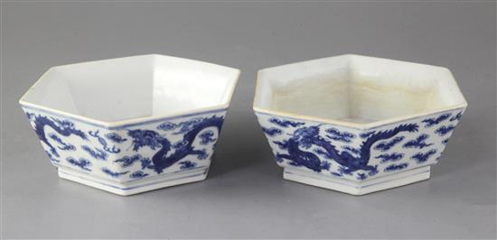 A pair of Chinese blue and white dragon hexagonal bowls, early 20th century, 18.5cm wide